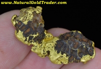 9.74 G. Murray ID Gold & Red Hematite Nugget